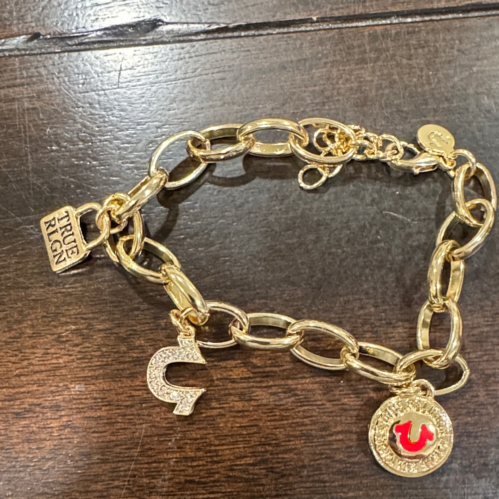 True Religion Gold and Red Charm Bracelet